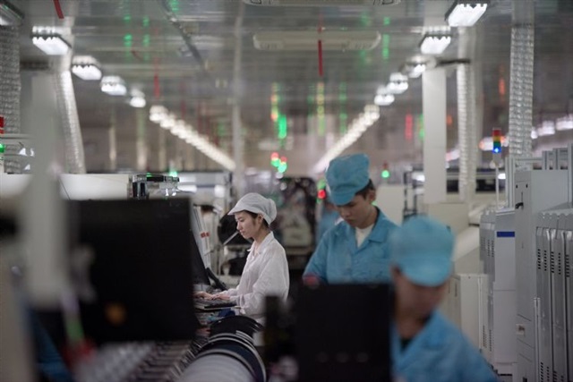 China IC exports surge 96% in H1 2026 on AI chip demand