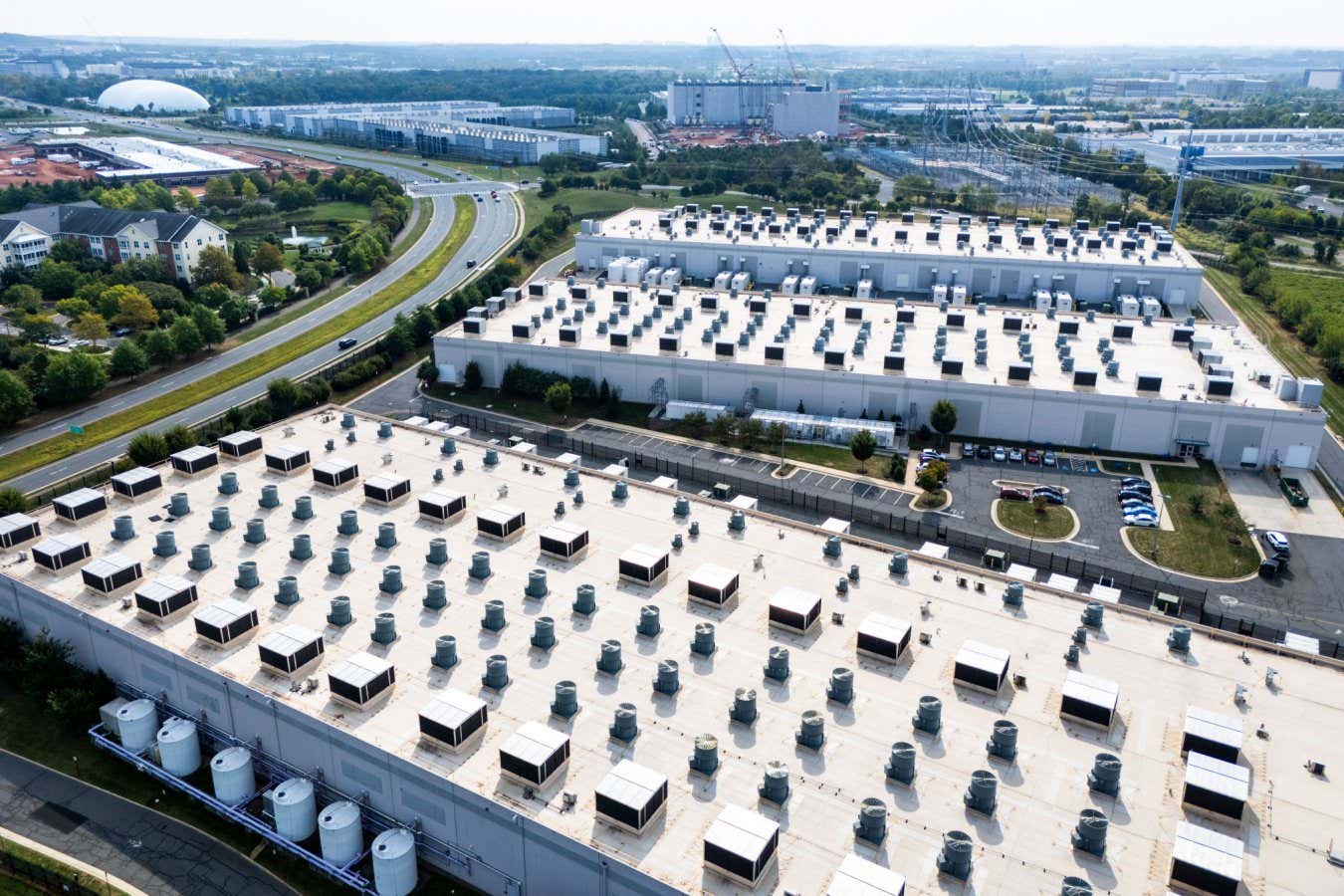 AI data centers are causing significant local heat pollution, with some facilities raising temperatures in surrounding areas by up to 9.1°C.