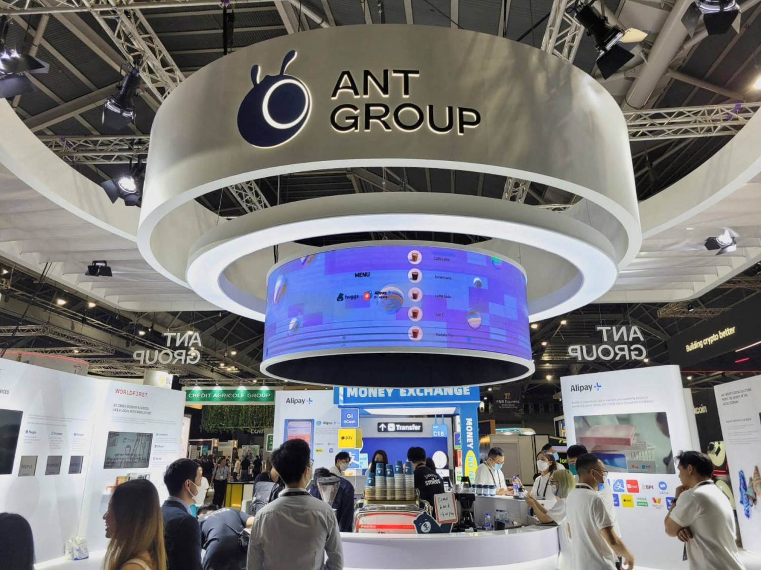 Ant Group is rolling out an AI agent interface for its Alipay super app, letting users book rides and manage money through voice or text requests as it escalates competition with WeChat.