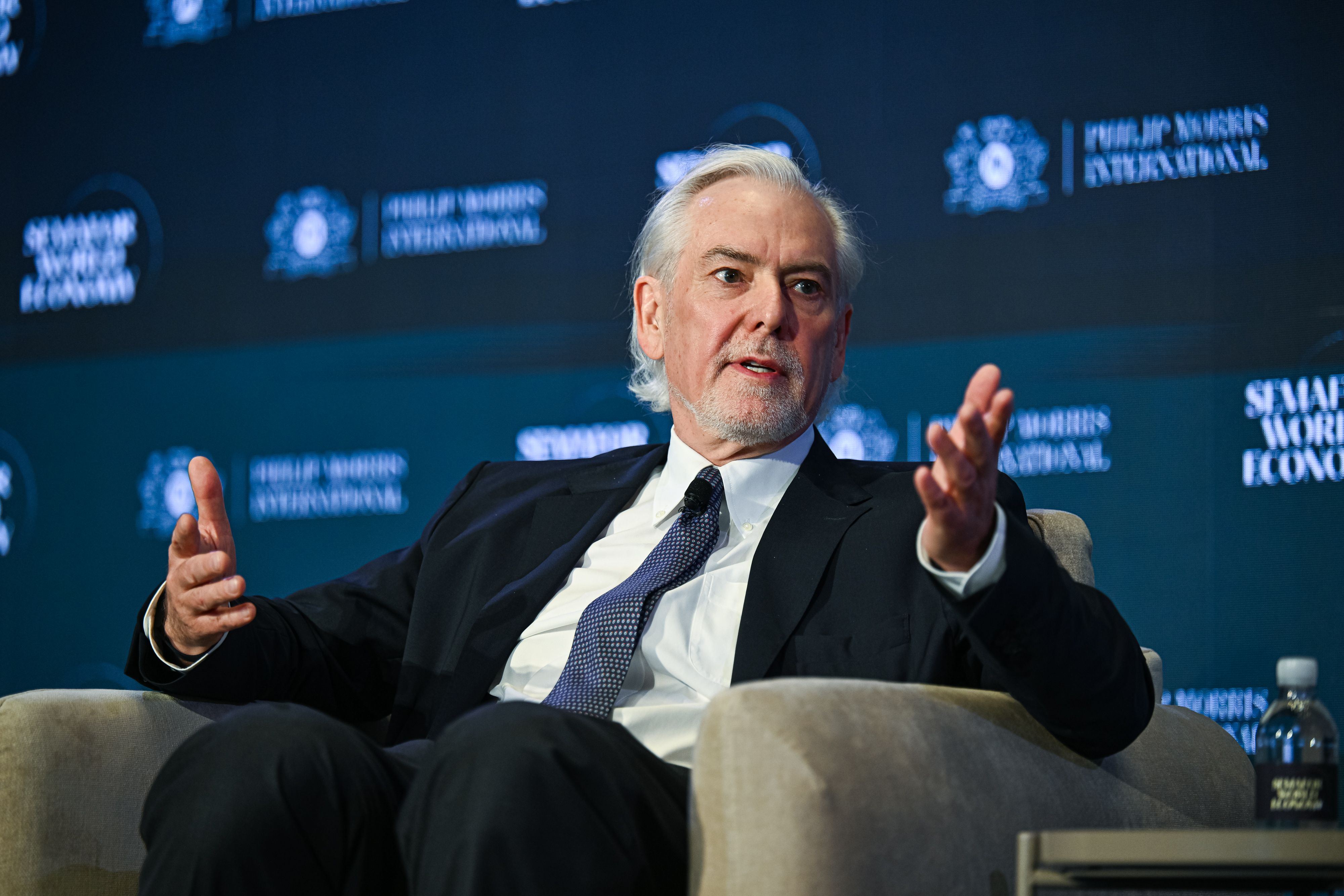 Philip Morris CEO argues rapid AI adoption at individual level will create competitive advantages between nations, citing China as a model for faster implementation.