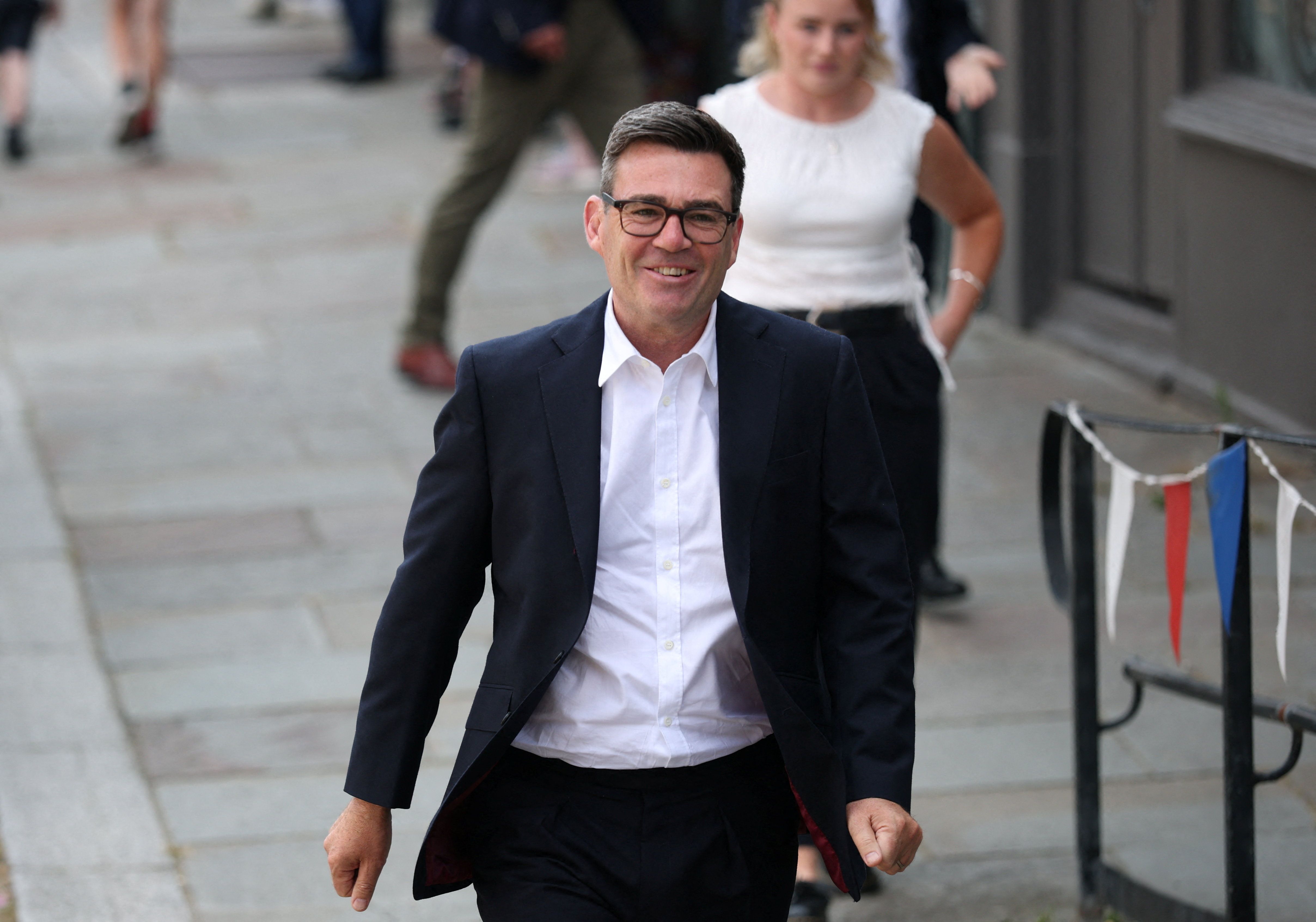UK's Burnham takes office, vows economic turnaround