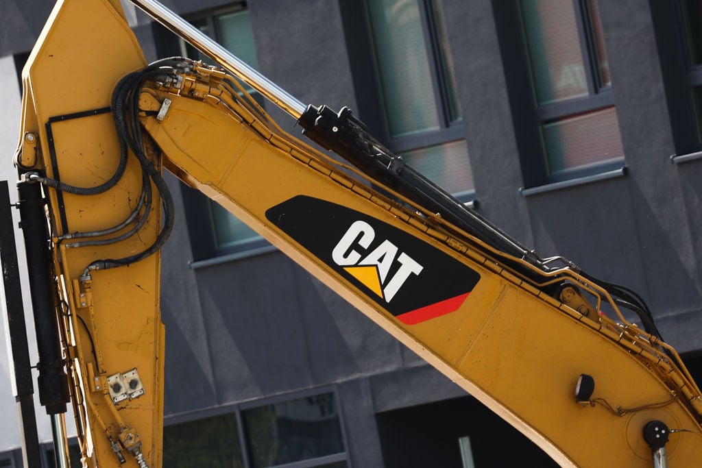 Caterpillar hits 11% of Dow on AI boom; stock split speculation rises